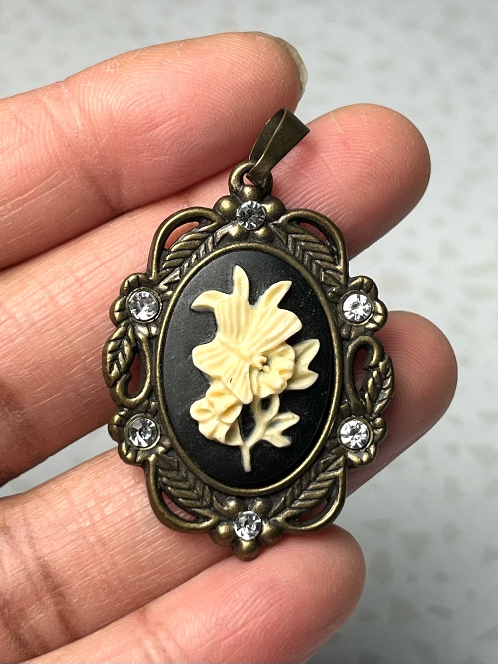 Victorian Oval Bronze Plated Black Floral Butterfly Cameo Pendant